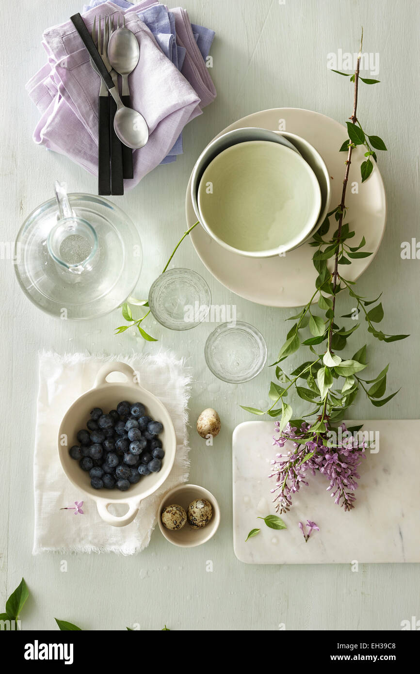 Overhead View of Dishes and Bowls of Blueberries and Duck Eggs, Studio Shot Stock Photo