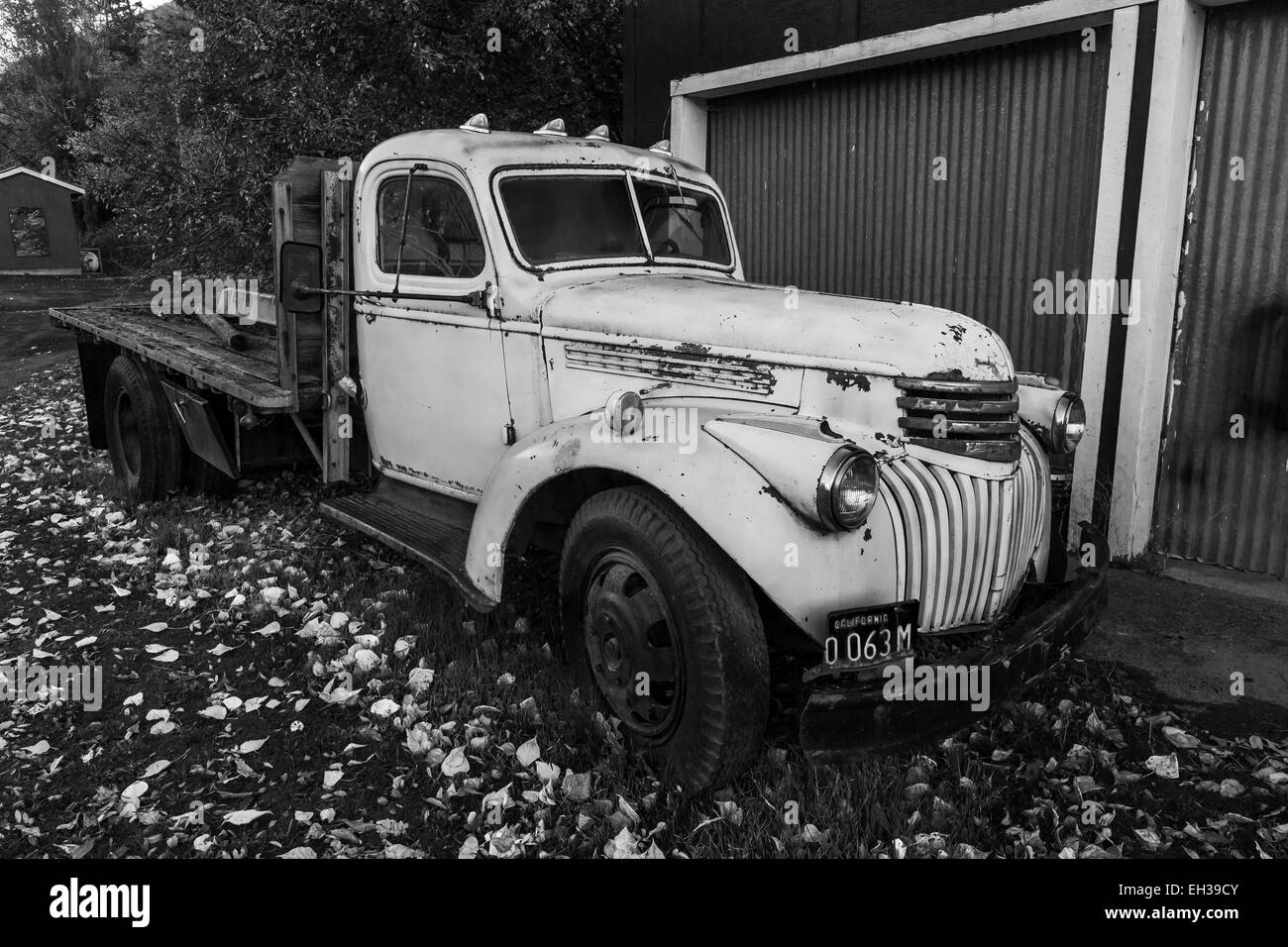 Old Chevrolet flatbed truck parked on the main street of Mitchell, Oregon, USA Stock Photo
