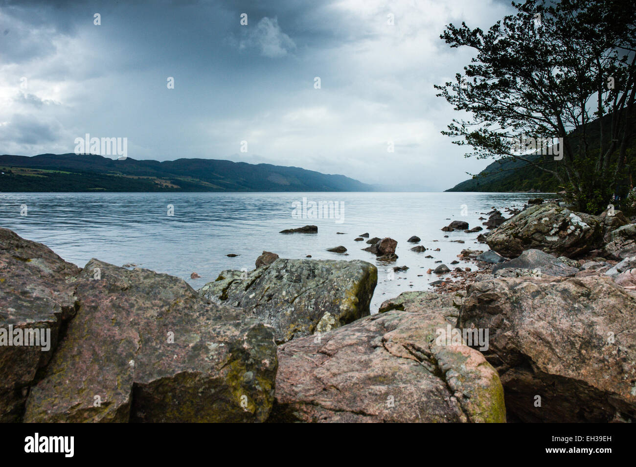 View of Loch ness Lake in Scotland, cloudy day and dramatic light Stock Photo