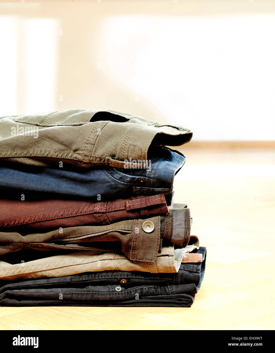 Close-up of Pile of Jeans, Studio Shot Stock Photo