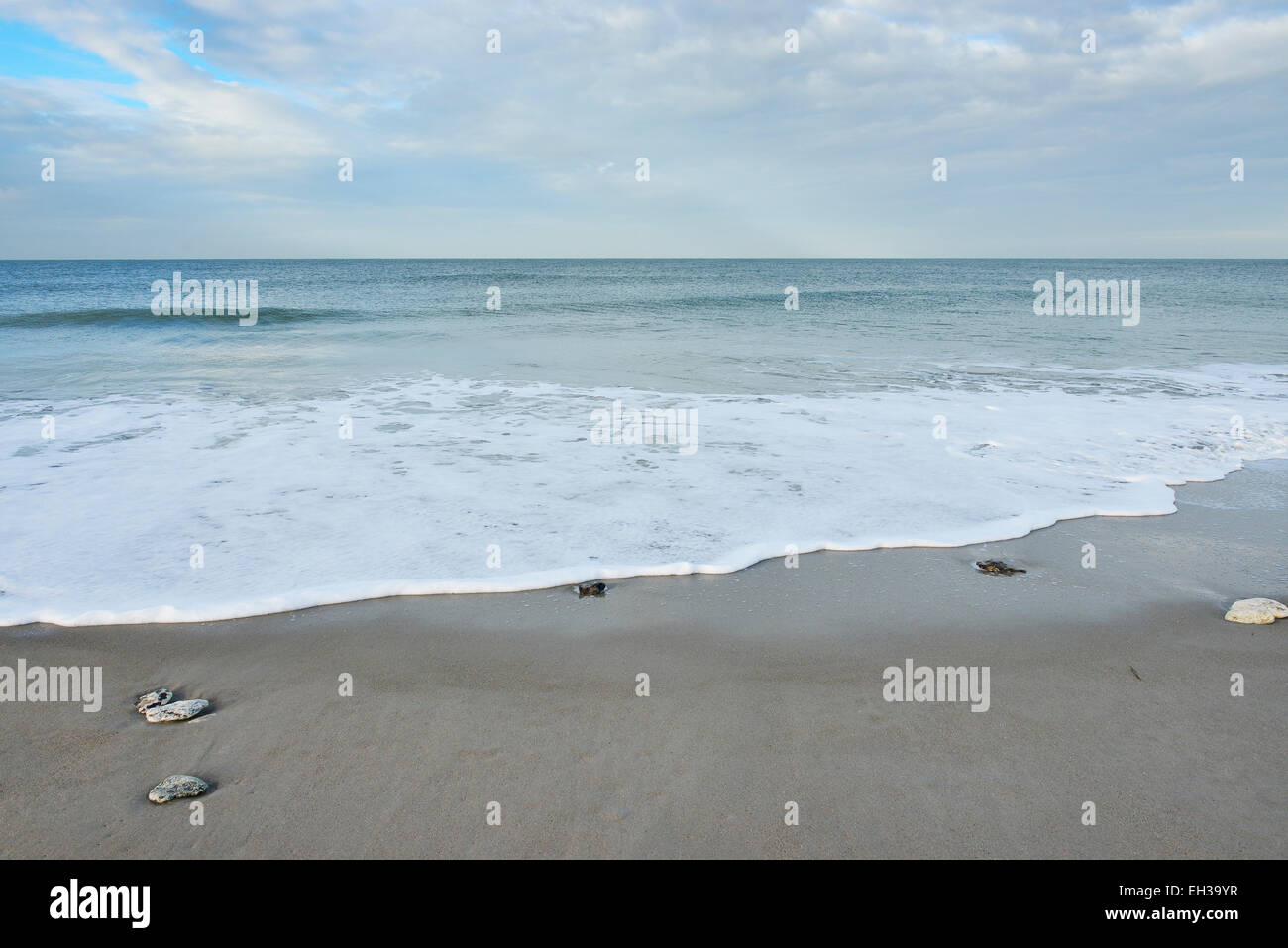 Surf on sandy beach at low tide, Helgoland, Germany Stock Photo