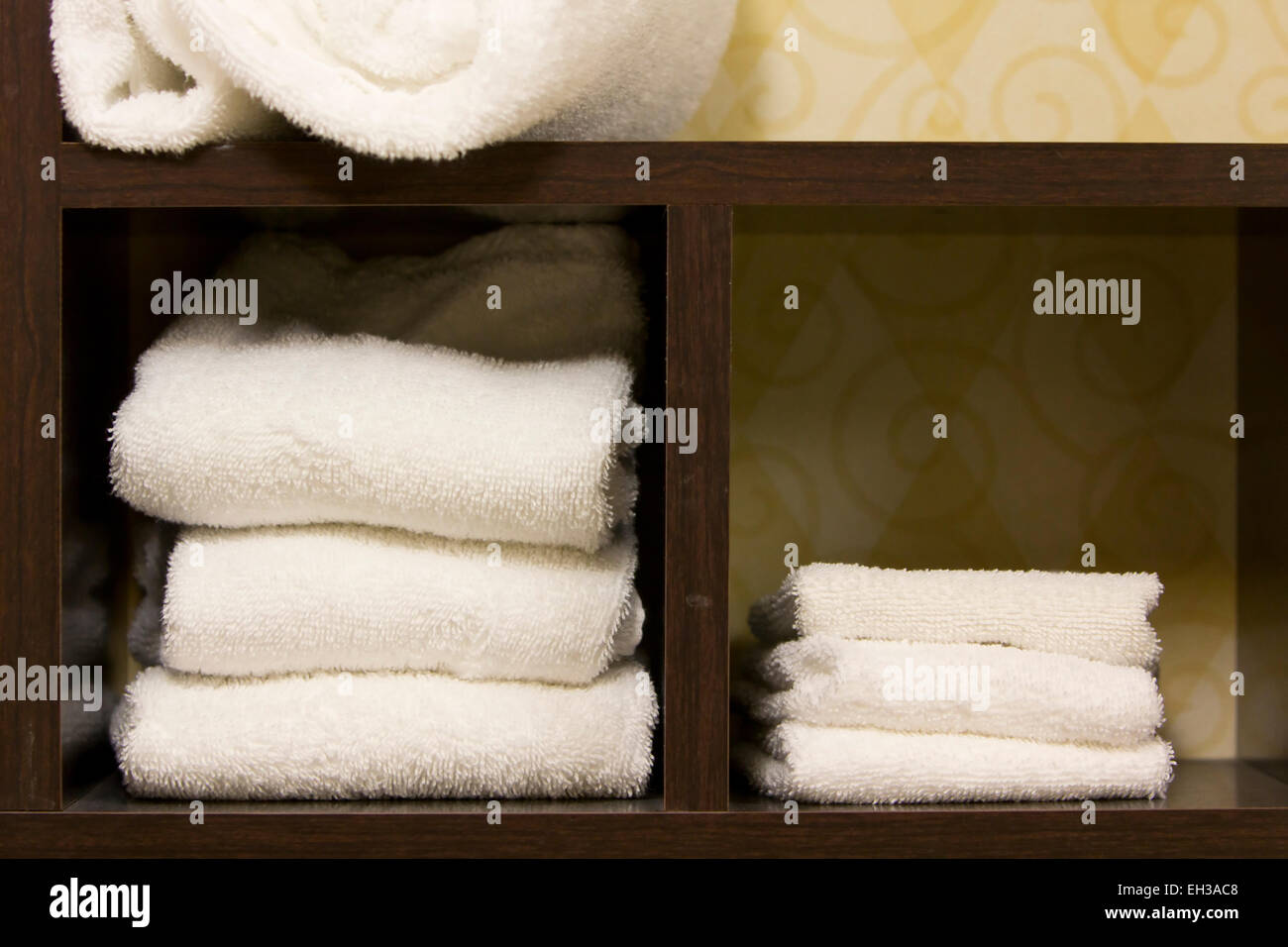 stored folded clean white bath towels Stock Photo Alamy