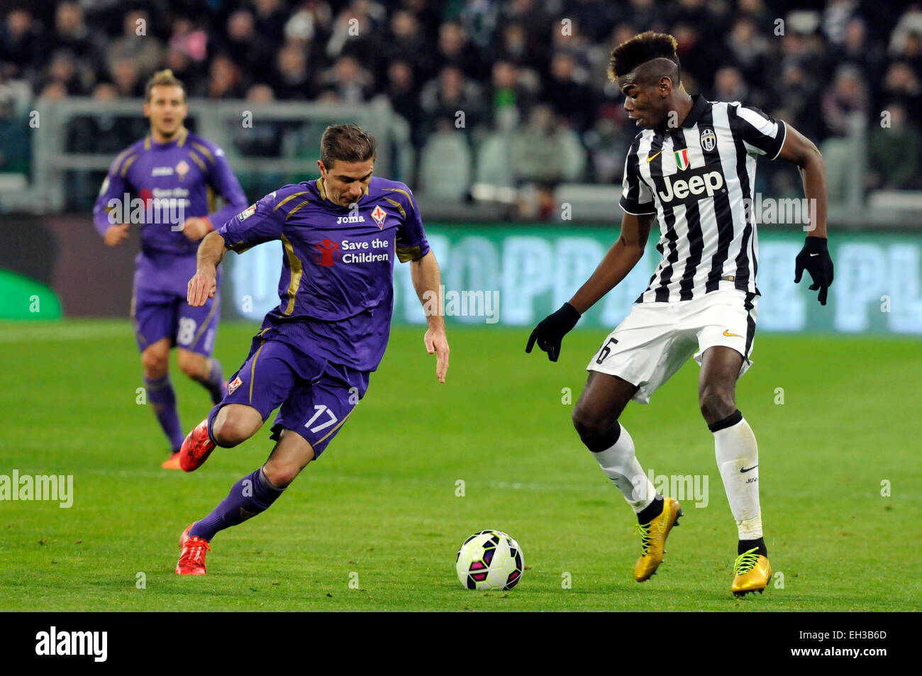 Turin, Italy. 05th Mar, 2015. Coppa Italia Semi Final. Juventus - Fiorentina. Paul Pogba dribbles past Sanchez Joachim. Credit:  Action Plus Sports/Alamy Live News Stock Photo