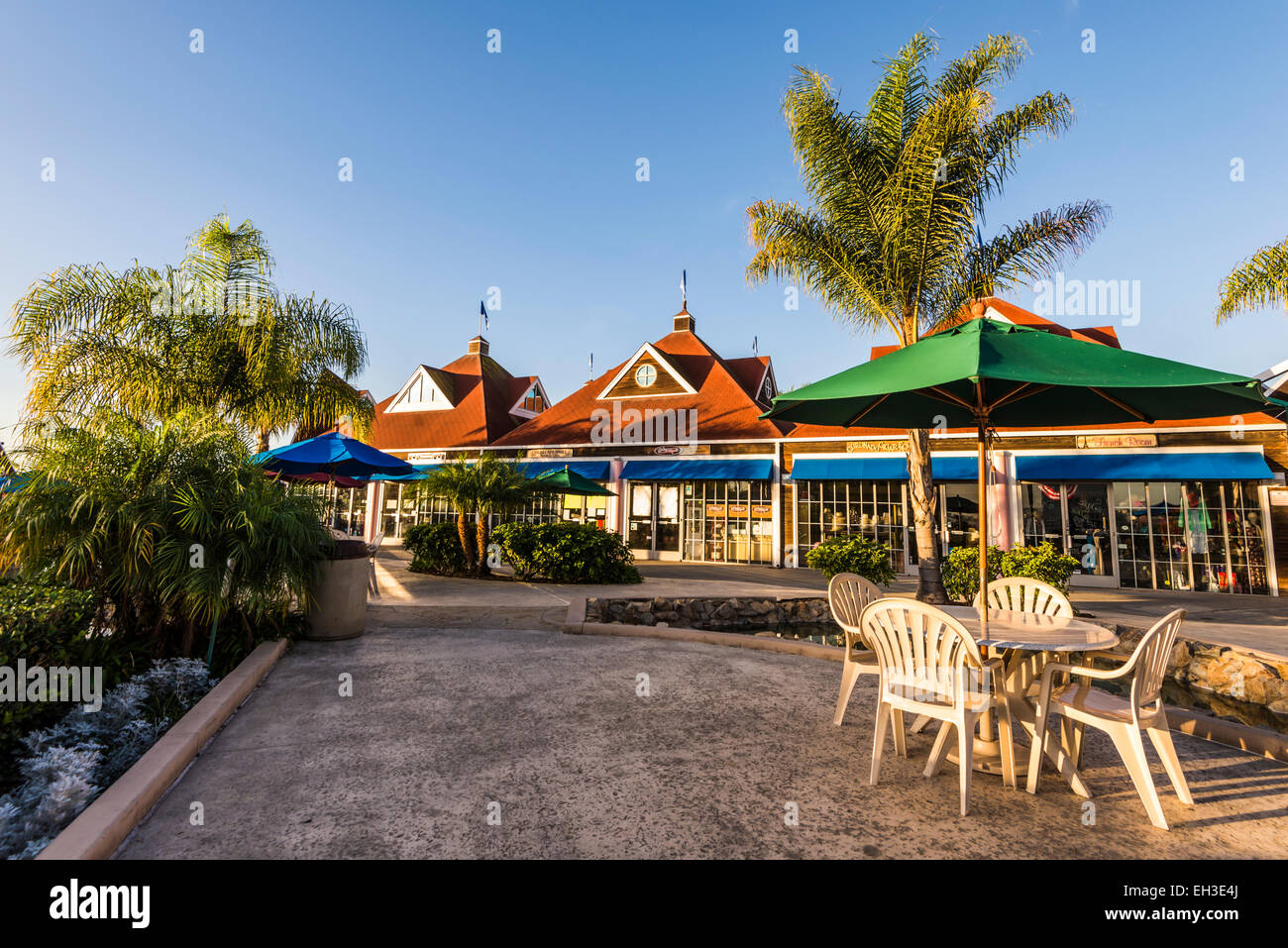 The Coronado Ferry Landing Shops illuminated by the rising Sun