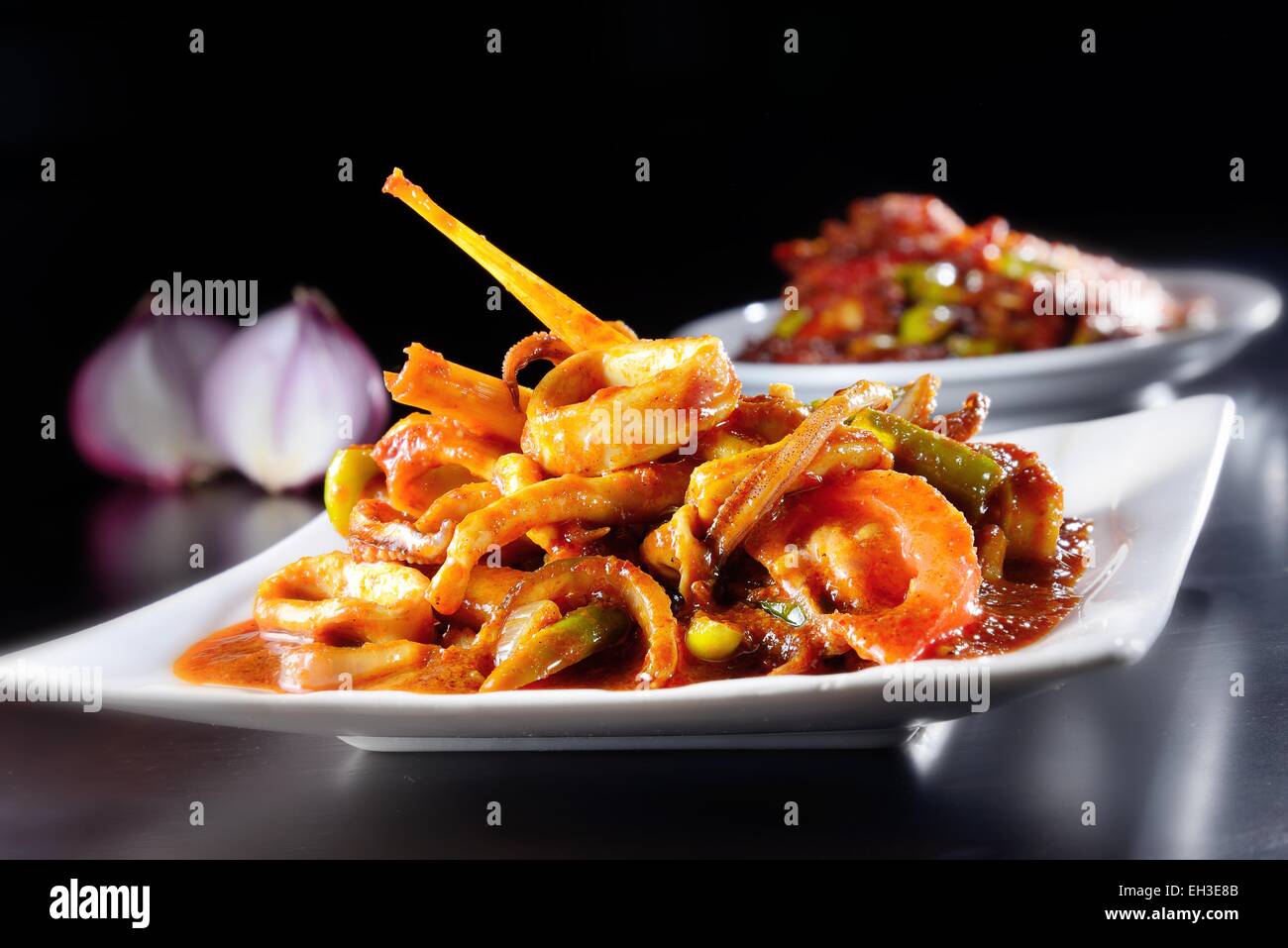 Sambal spicy squid cook in traditional baba style Stock Photo