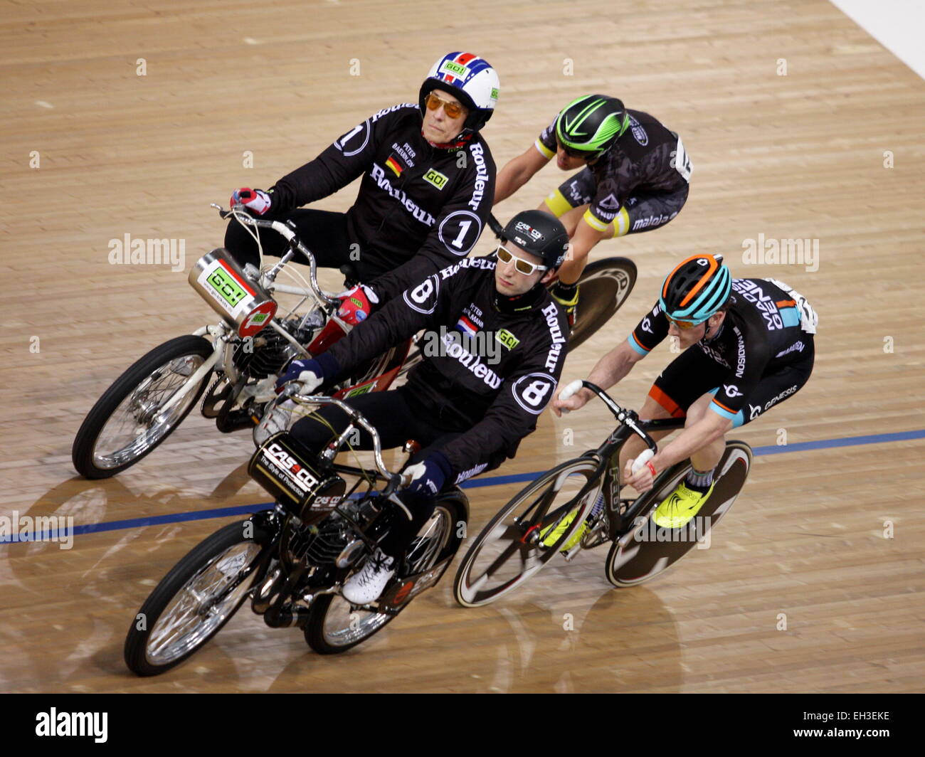 Lee Valley VeloPark, London, UK. 28th February 2015. Riders bunch up in the Revolution Derny Race Stock Photo