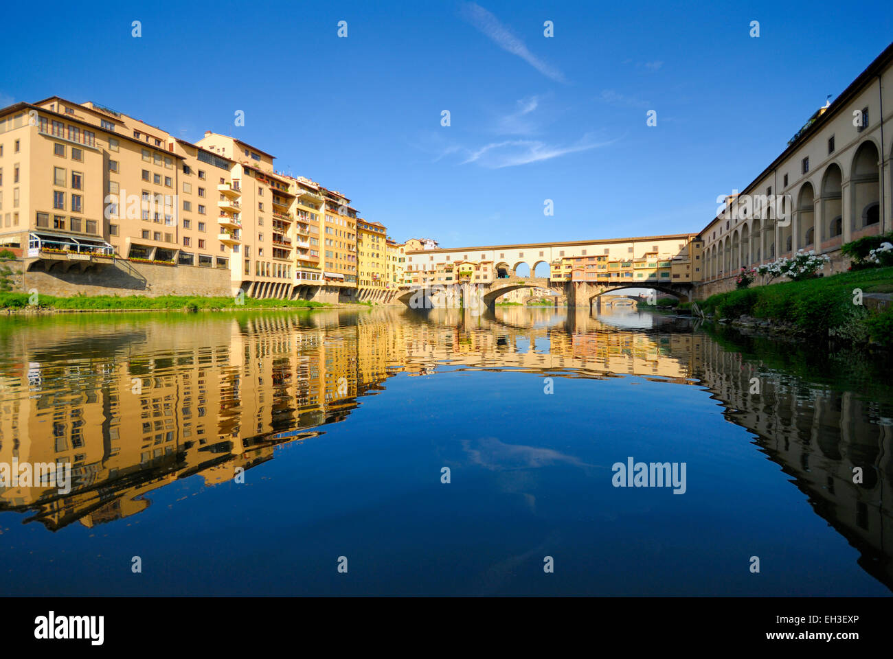 Ponte Vecchio bridge across Arno river at dawn, Florence, Tuscany, Italy Stock Photo