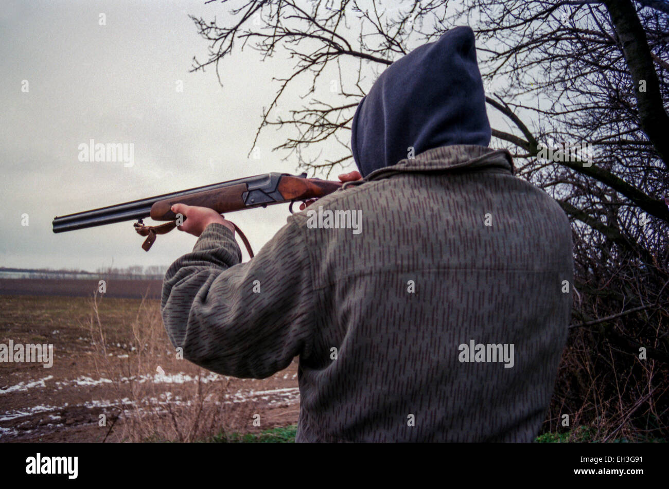 Poacher hunting Stock Photo