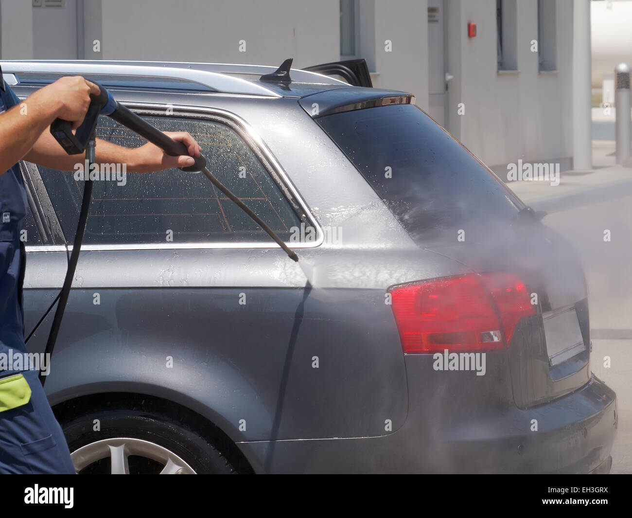 car washing with high pressure water jet Stock Photo