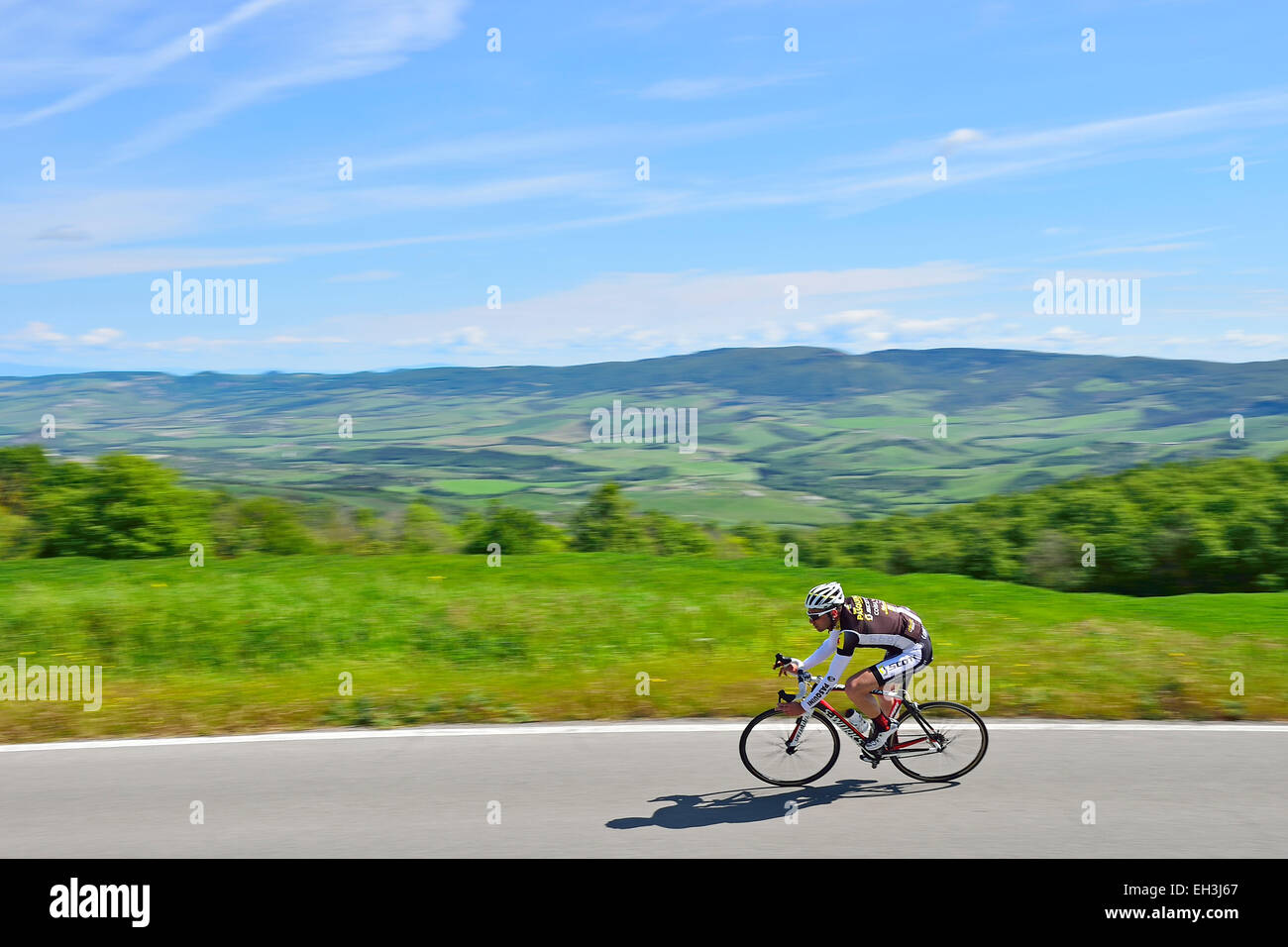 Racing cyclist, Radicofani, Tuscany, Italy Stock Photo