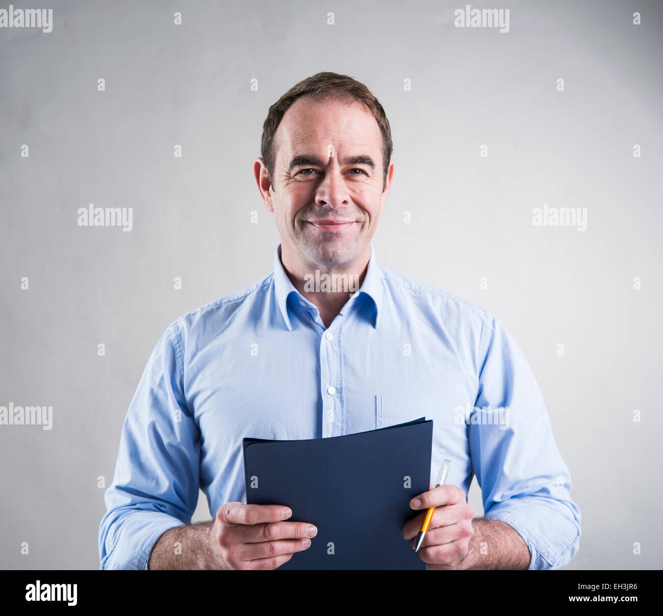 Successful businessman being happy Stock Photo