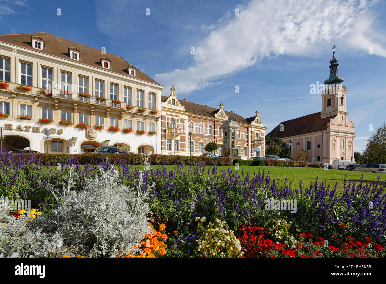 Town Hall, old Sparkasse bank building and parish church in the main square, Pinkafeld, Southern Burgenland, Burgenland, Austria Stock Photo