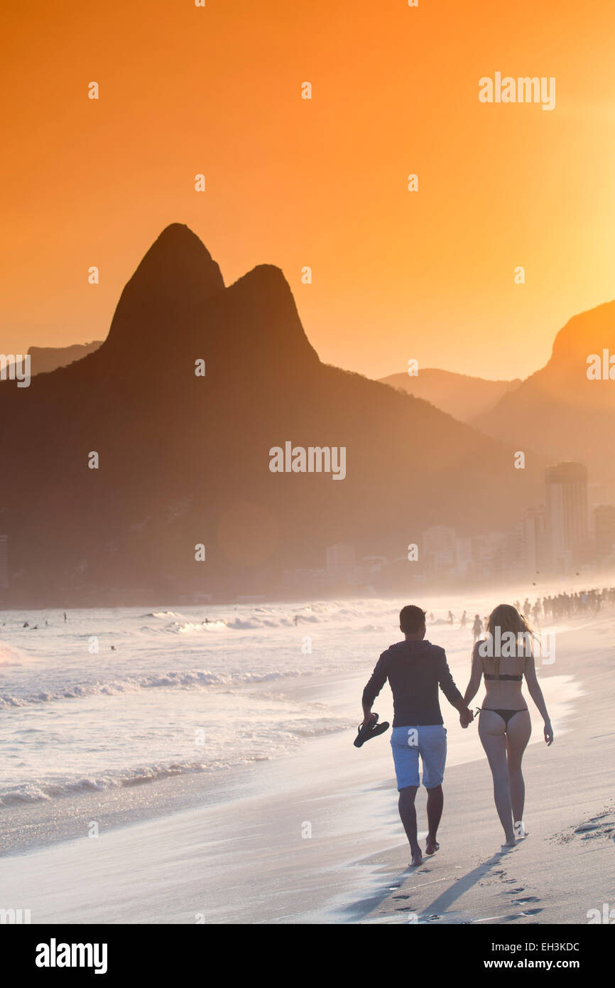 Ipanema and Leblon beach at sunset with the Morro dos Dois Irmaos (Two Brothers) hills behind, Rio de Janeiro, Brazil Stock Photo
