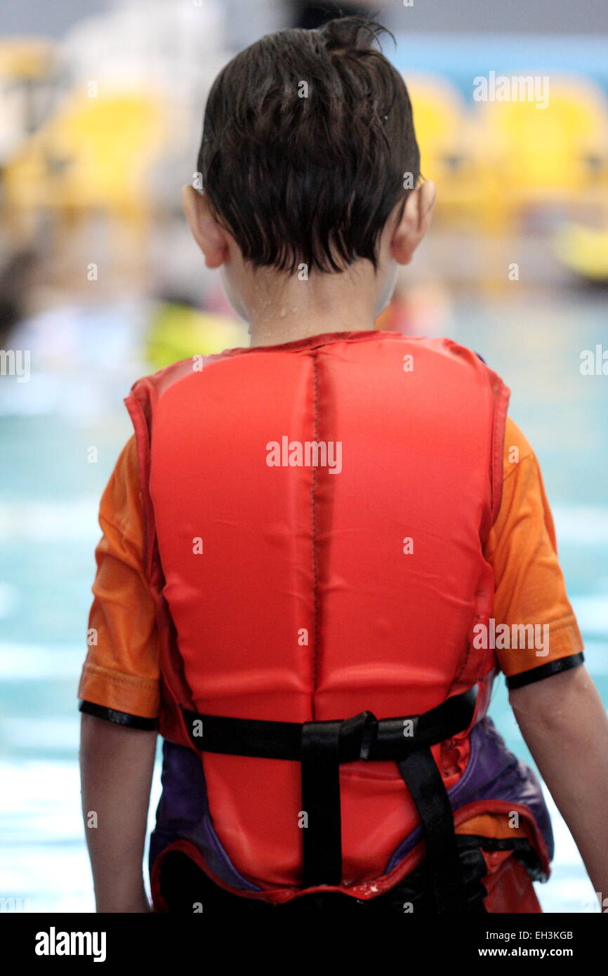 Child wearing life jacket hi-res stock photography and images - Alamy