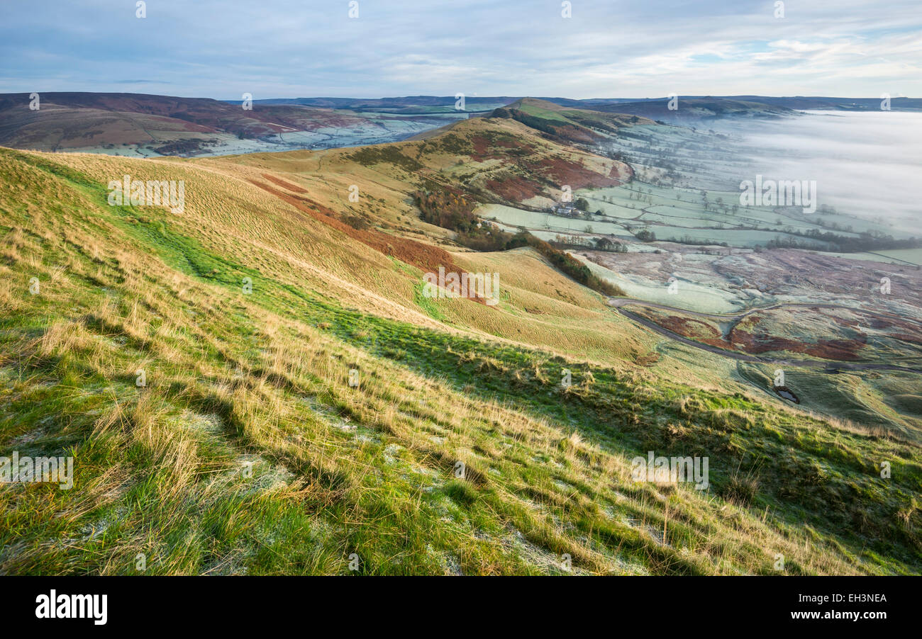 View along the ridge from Mam Tor on a frosty, misty morning in the Peak District, Derbyshire. Stock Photo