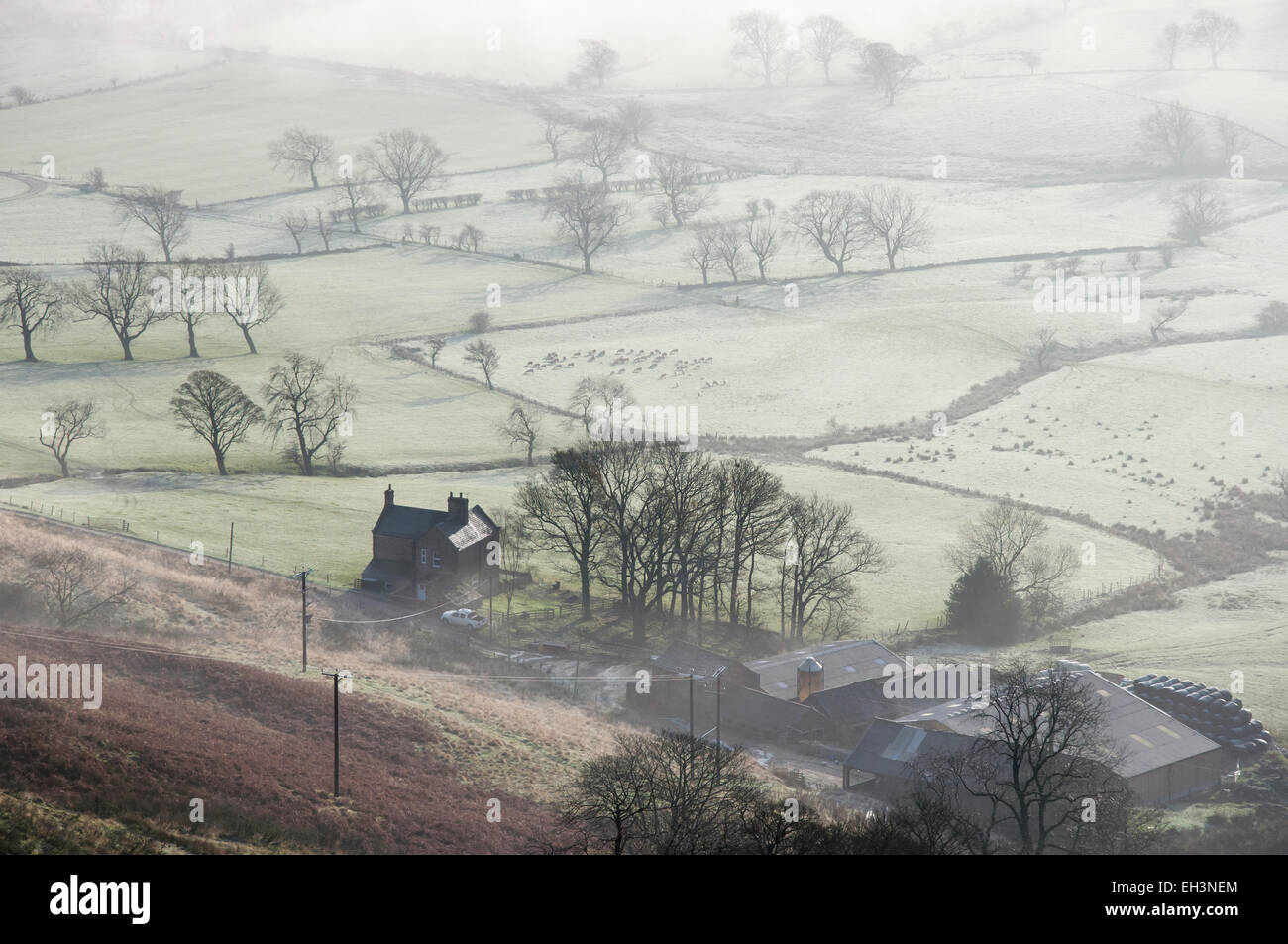 Farm and frosty fields on a winter morning in Castleton, Peak DIstrict, Derbyshire. Stock Photo
