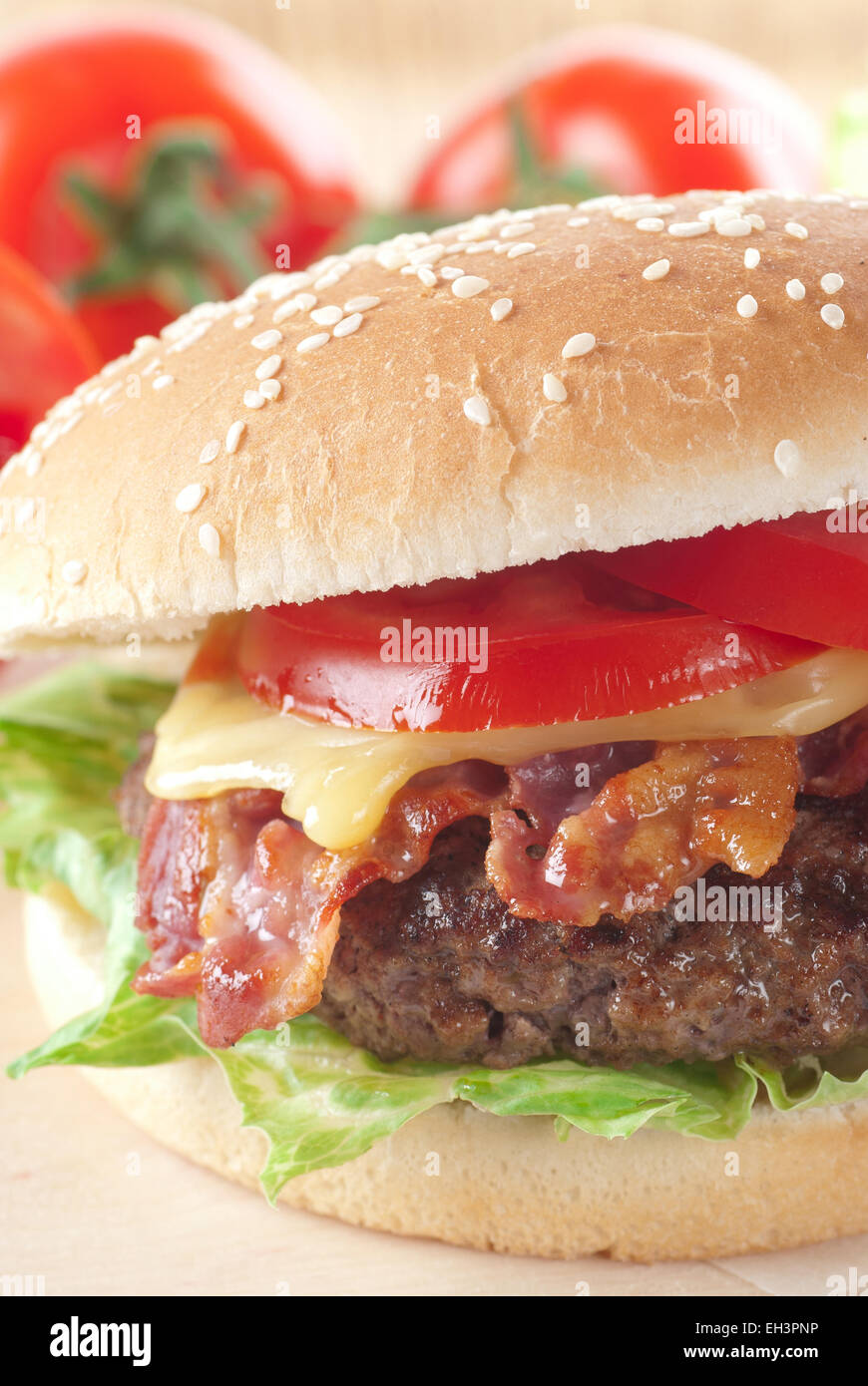 Grilled cheeseburger with bacon close up. Stock Photo