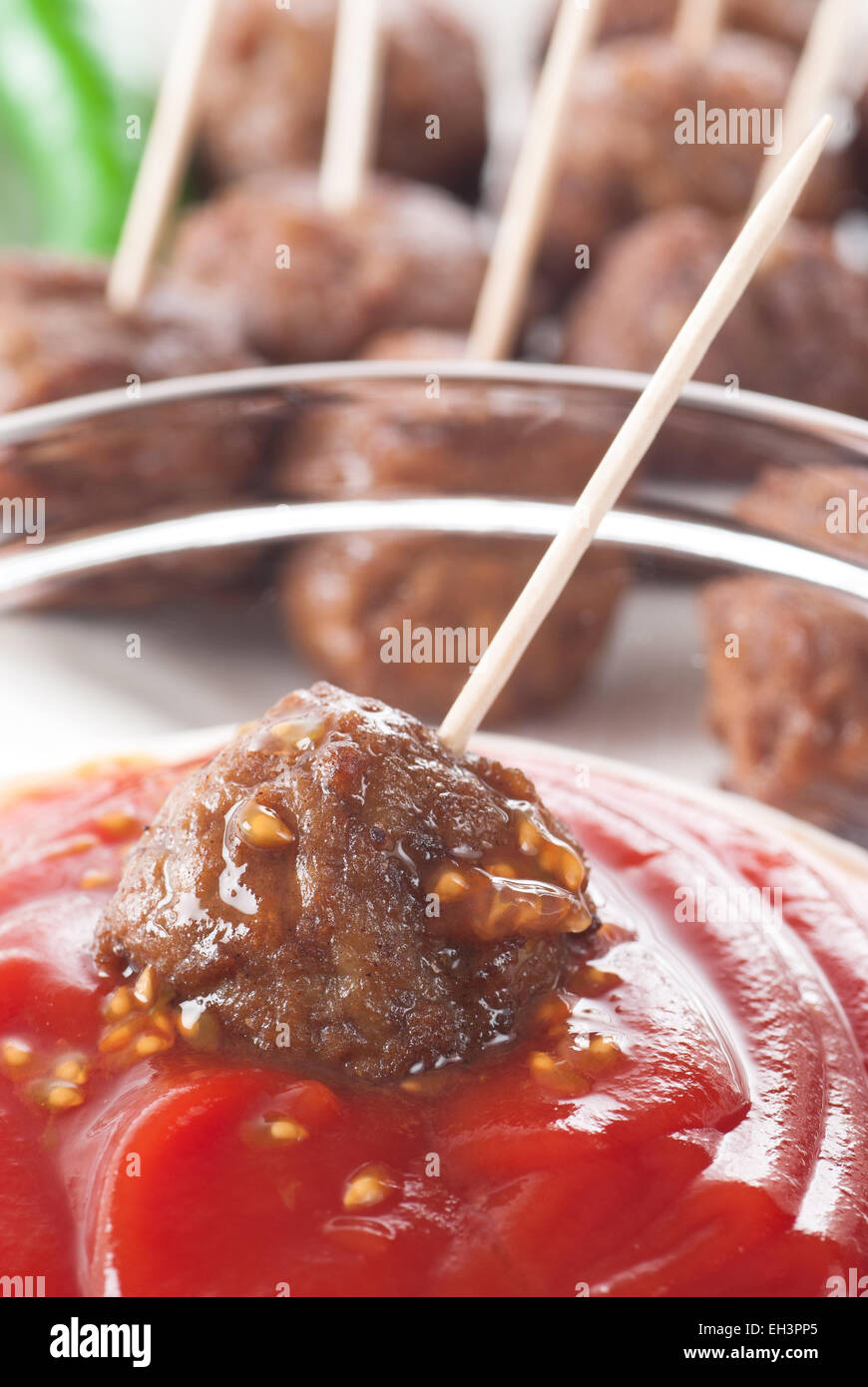 Meatball appetizer  in tomato sauce. Stock Photo