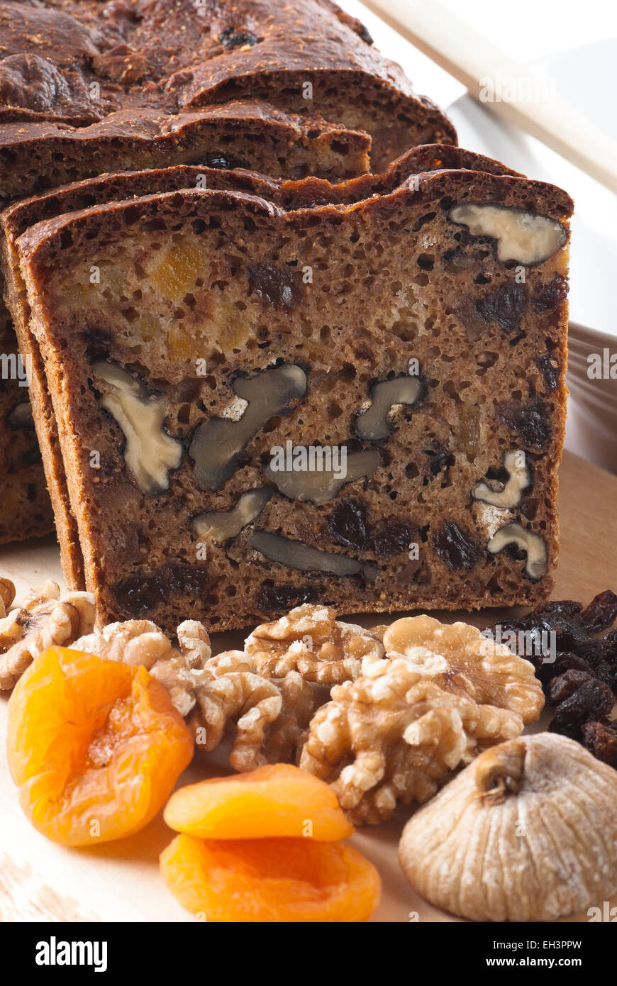 Juicy dark bread with walnut, raisin, dried fig and apricot Stock Photo Alamy