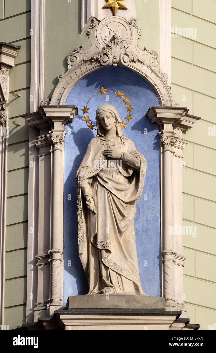Virgin Mary, statue on the house facade in Graz, Styria, Austria on ...
