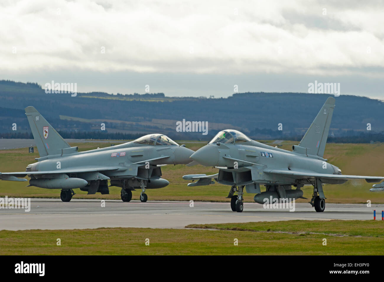 Eurofighter Typhoons ZK322 (BR) and ZK313 (W) preparing for line up on RAF Lossiemouth runway 23, Moray. Scotland.  SCO 9621. Stock Photo