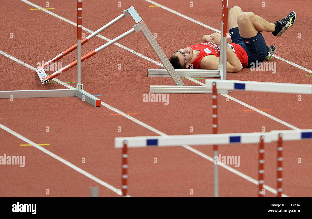 Prague, Czech Republic. 6th Mar, 2015. Petr Penaz of Czech Republic lies on the floor after stumbling during a men's 60m hurdles heat at the European Athletics Indoors Championships in Prague, Czech Republic, on Friday, March 6, 2015. Credit:  Katerina Sulova/CTK Photo/Alamy Live News Stock Photo