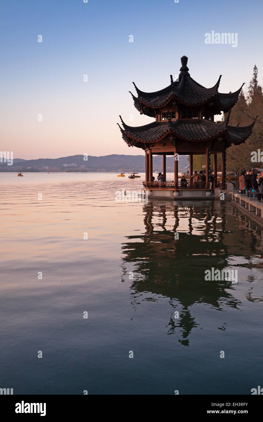 Hangzhou, China - December 5, 2014: Traditional Chinese ancient pavilion on the West Lake coast in Hangzhou city center Stock Photo