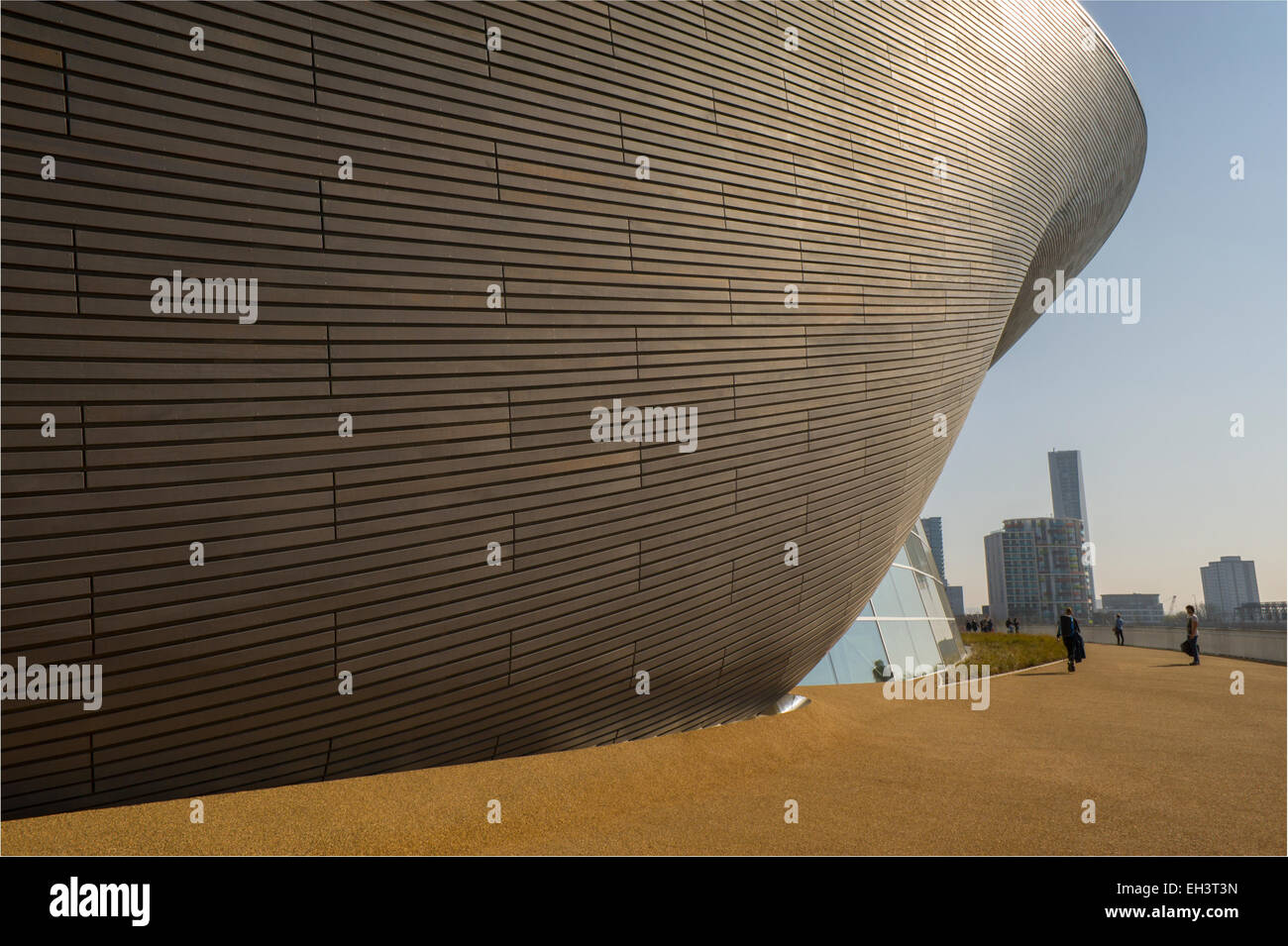 Exterior of the London Aquatics Centre at Stratford city designed by Zaha Hadid architects and build by Ove Arup and Partners fo Stock Photo