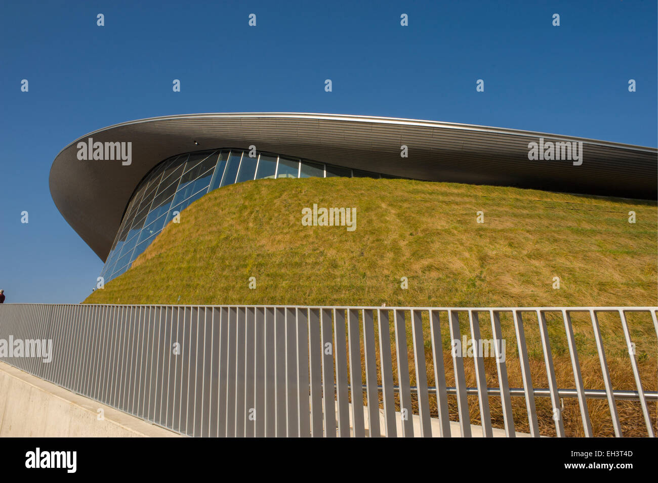 Exterior of the London Aquatics Centre at Stratford city designed by Zaha Hadid architects and build by Ove Arup and Partners fo Stock Photo