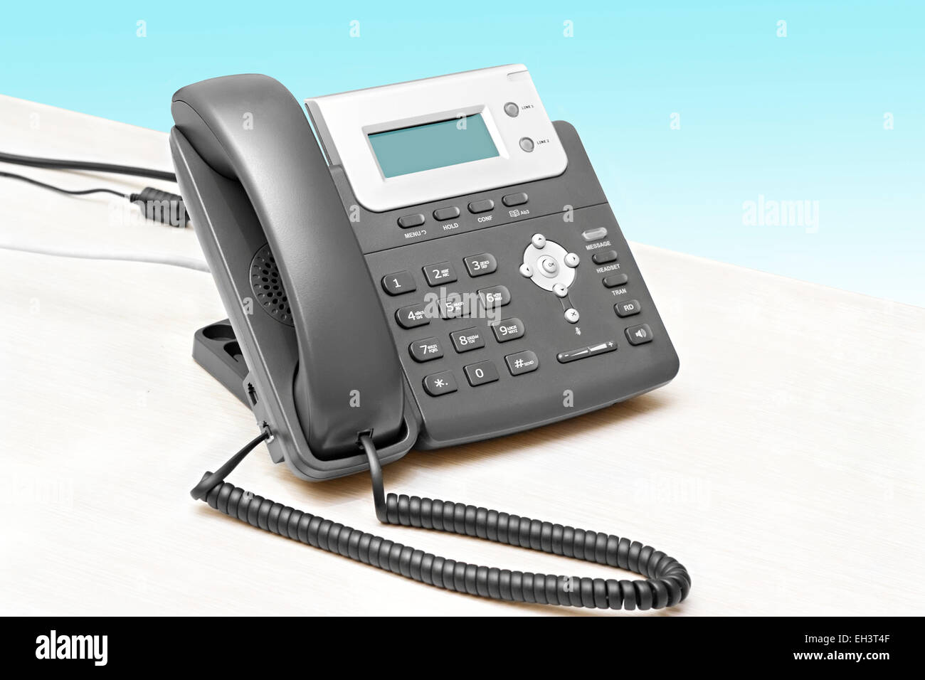 IP phone with a display table at the isolated Stock Photo
