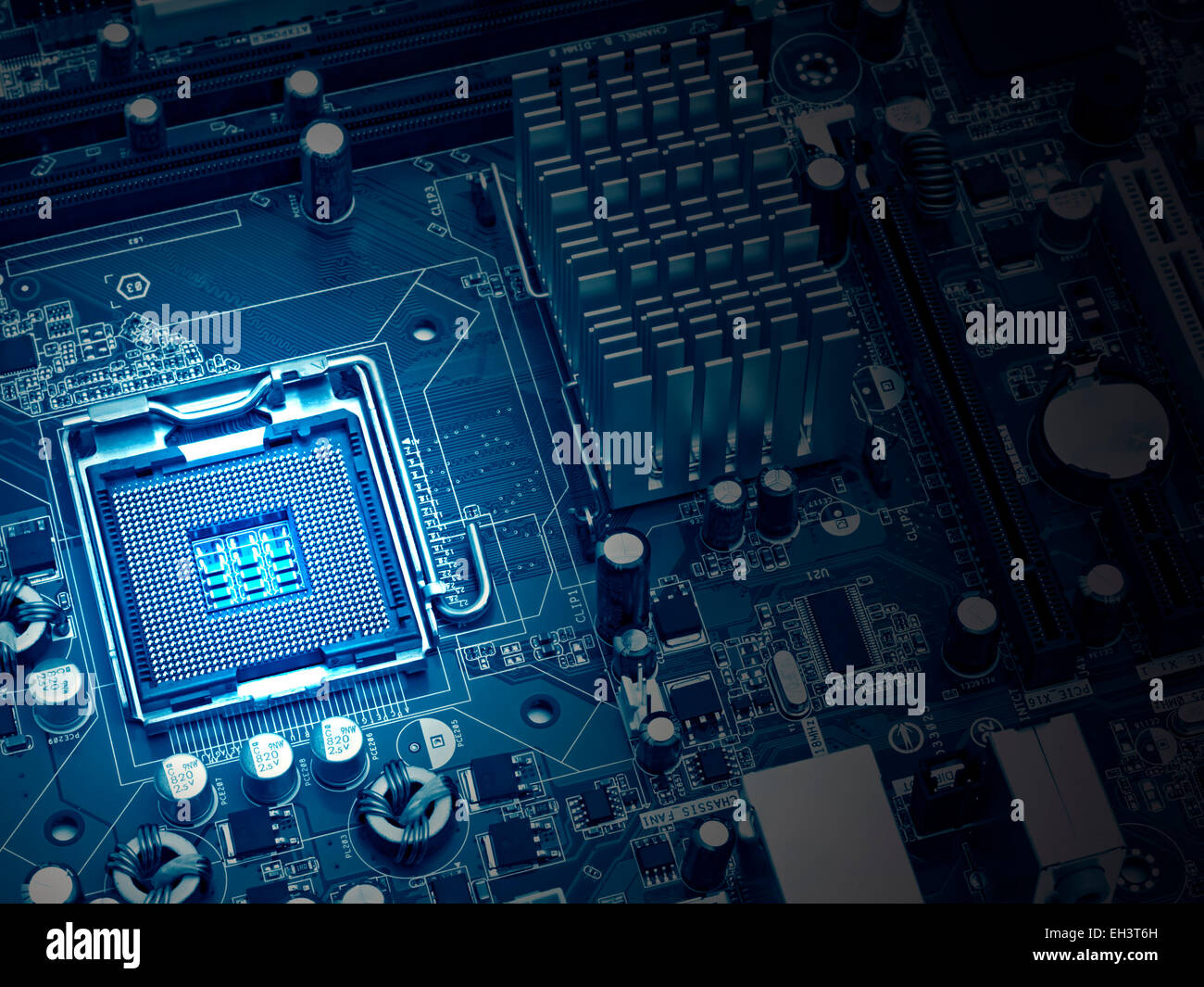 image of the motherboard without a PC processor closeup, Blue tone and light effect Stock Photo