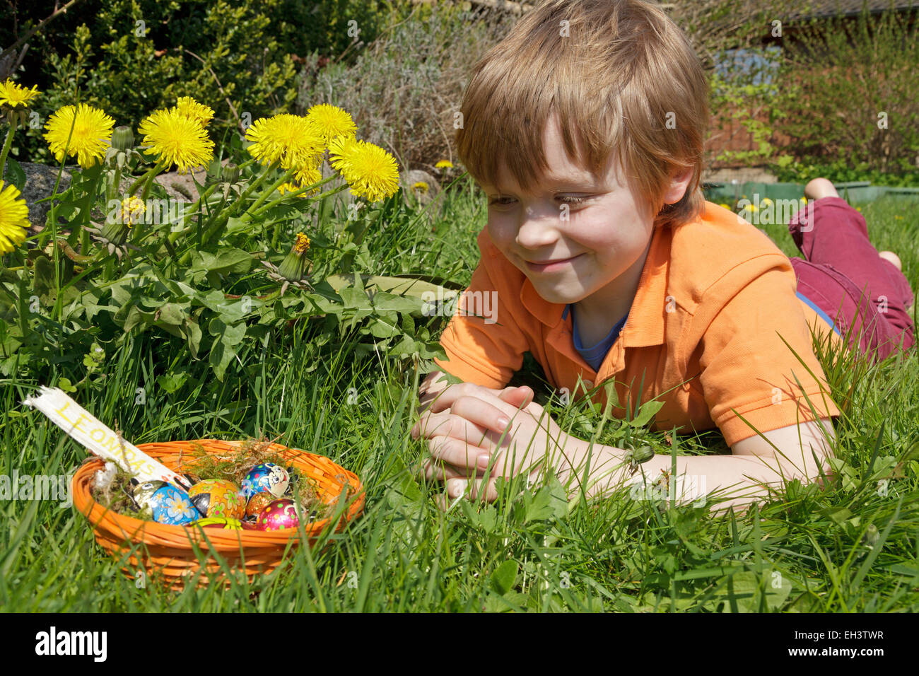 happy young boy has found Easter Eggs Stock Photo