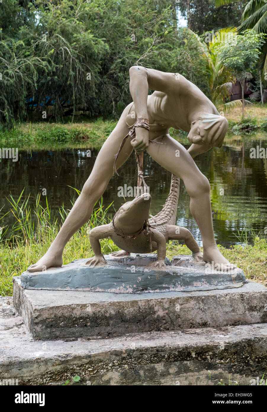 Abey the Crocodile hunter by Cuban sculptress Rita Longa at Guama, a Taino village, recreated as a holiday destination, Cuba. Stock Photo