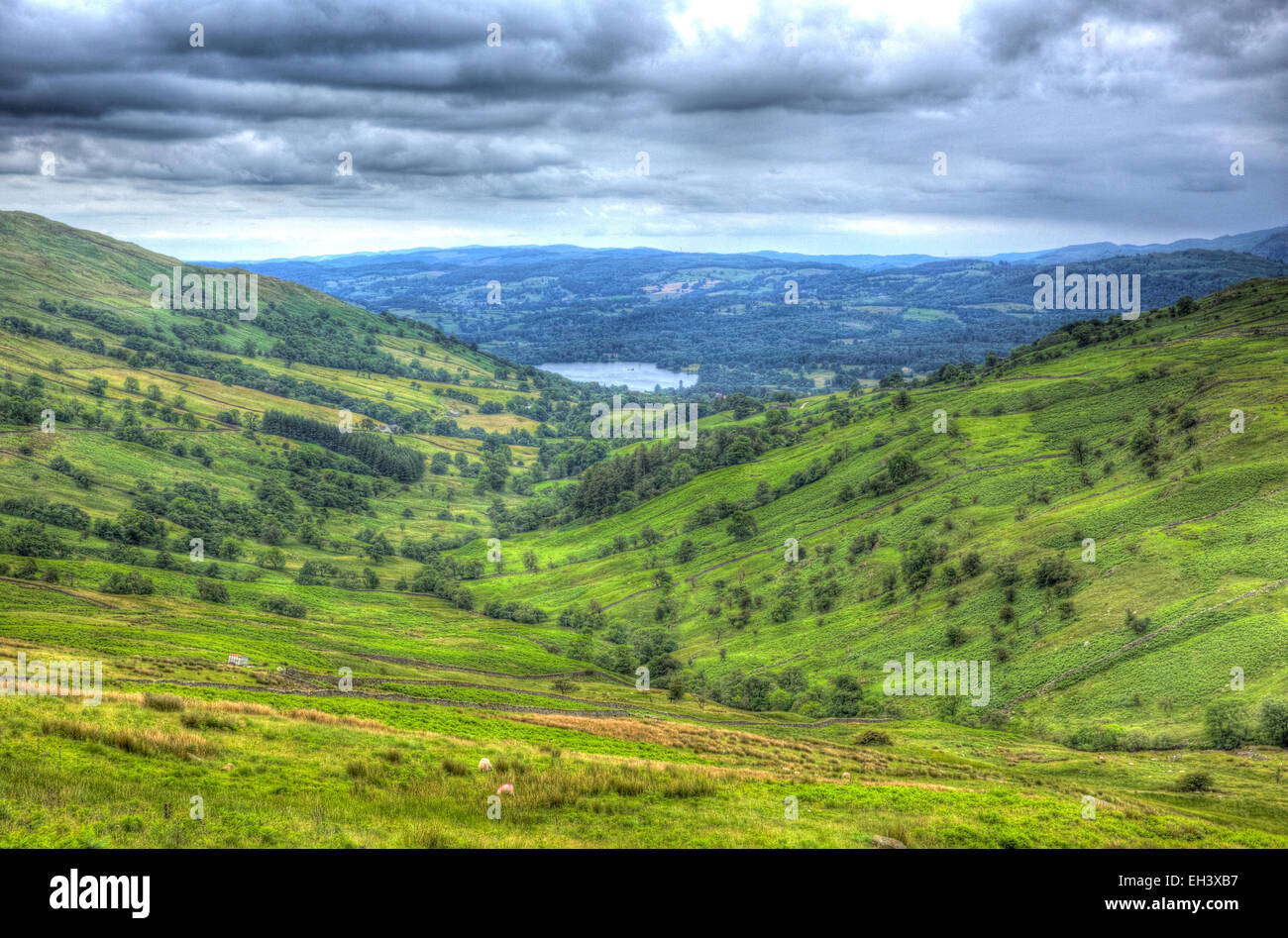 Kirkstone Pass view towards Grasmere by Kirkstone Pass Inn Lake District England UK with countryside in HDR Stock Photo