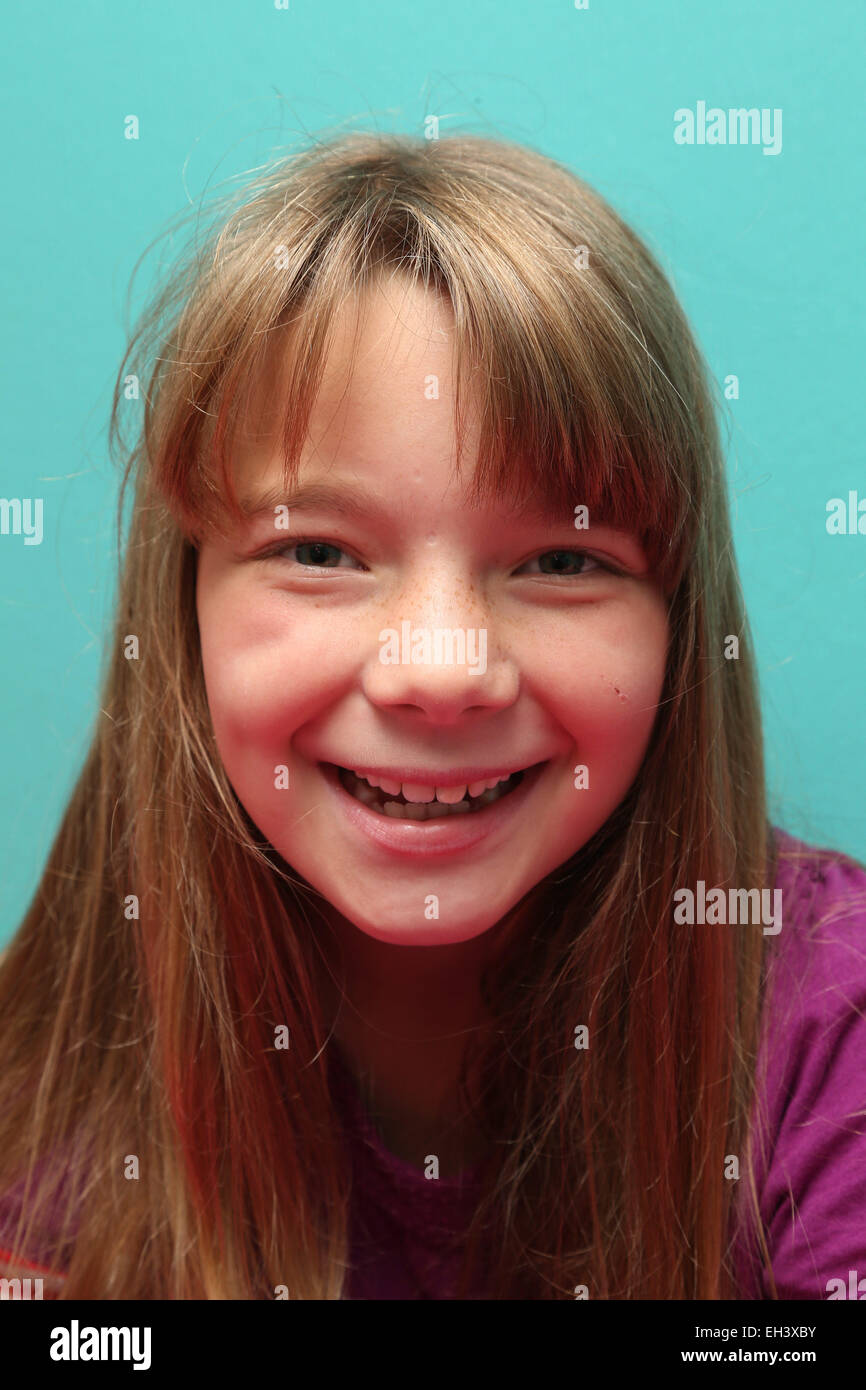 Portrait of girl smiling Stock Photo - Alamy