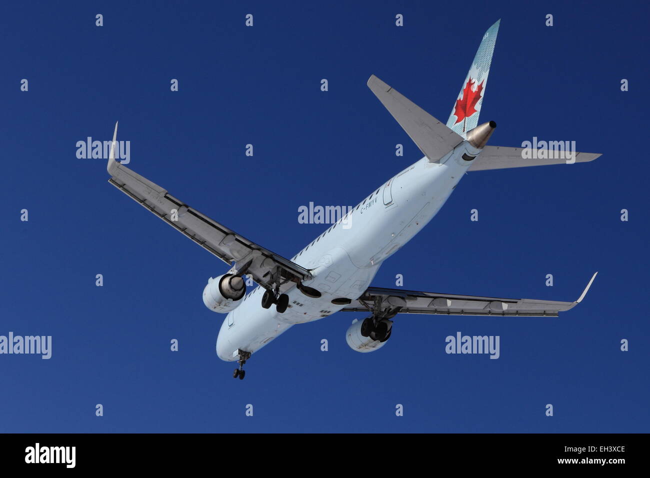 Embraer E190 C-FMYV Air Canada on final approach at YOW Ottawa Canada, March 5, 2015 Stock Photo