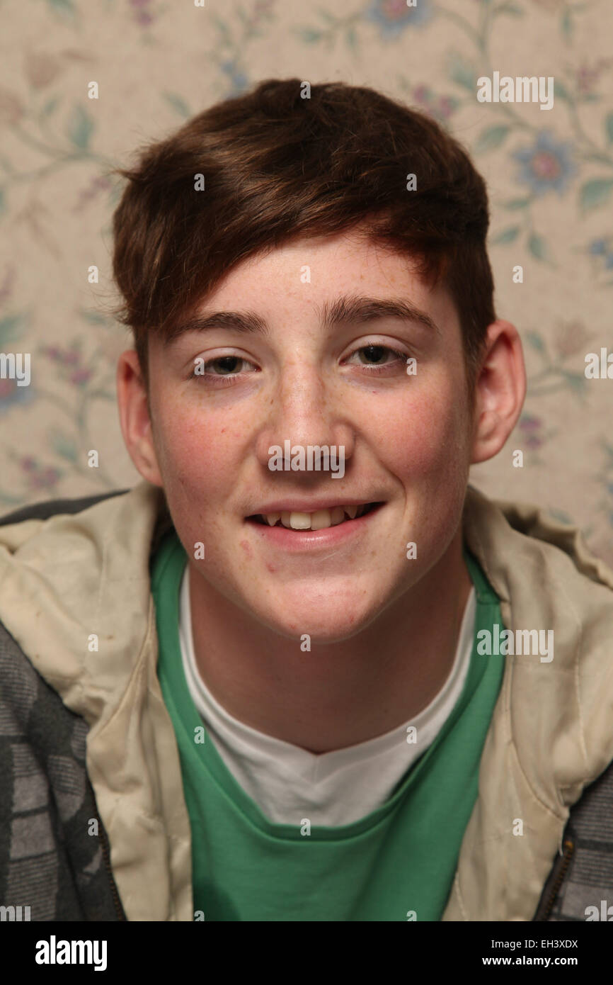 Teenage boy smiling Stock Photo - Alamy