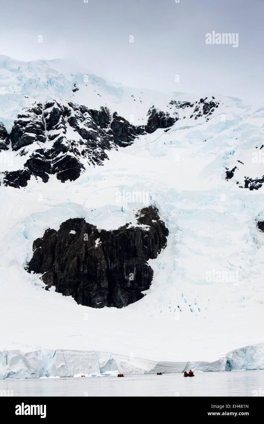 Antarctica, Paradise Bay, cruise ship passengers on zodiac cruise to end of glacier Stock Photo