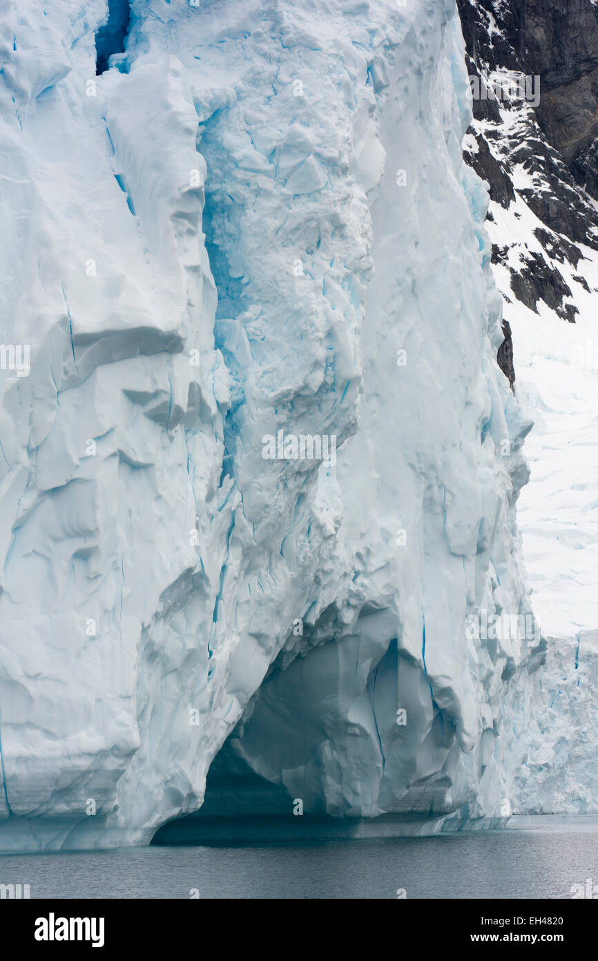 Antarctica, Paradise Bay, end of glacier breaking away into sea to form icebergs Stock Photo