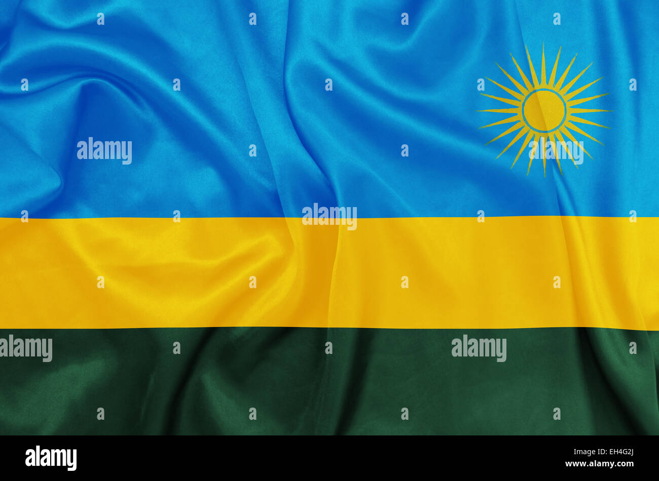 Rwanda - Waving national flag on silk texture Stock Photo