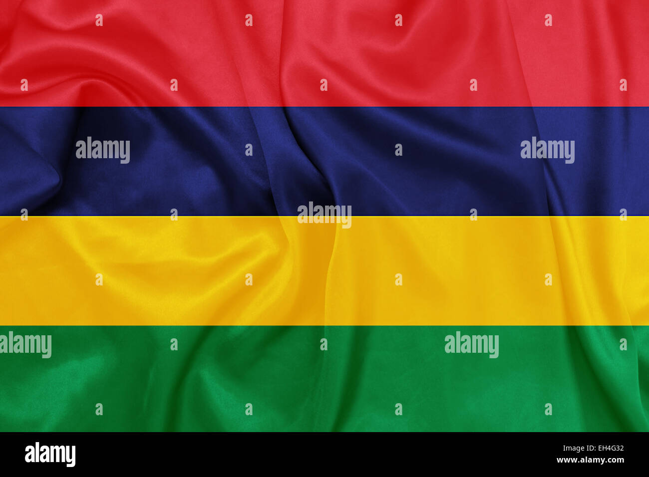 Mauritius - Waving national flag on silk texture Stock Photo
