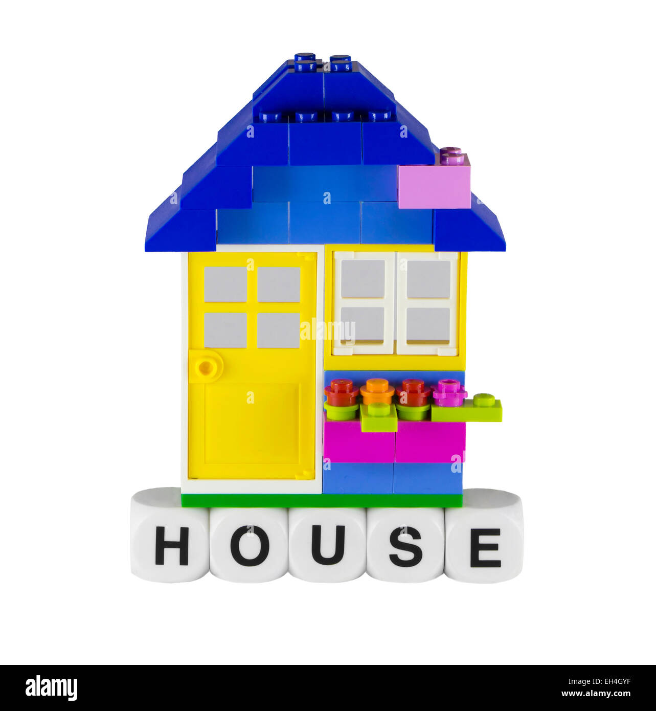 A little toy house with yellow door Stock Photo