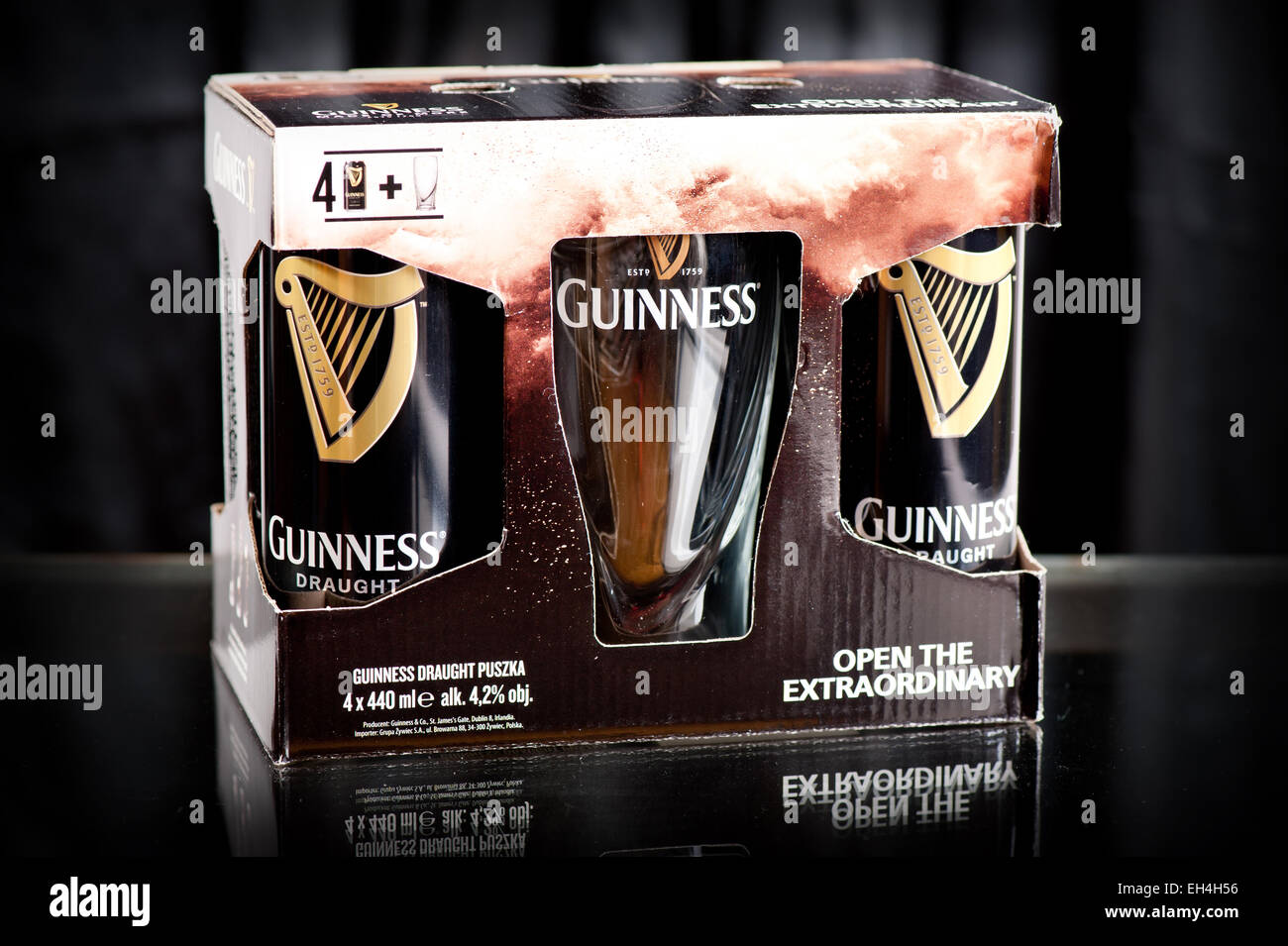Four pack of Guinness draught beer cans Stock Photo