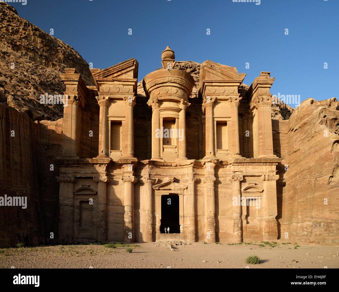 Jordan, Nabataean archeological site of Petra, listed as World Heritage by UNESCO, the famous and elaborately carved façade of Al Deir (the Monastery), carved out of a sandstone rock face Stock Photo