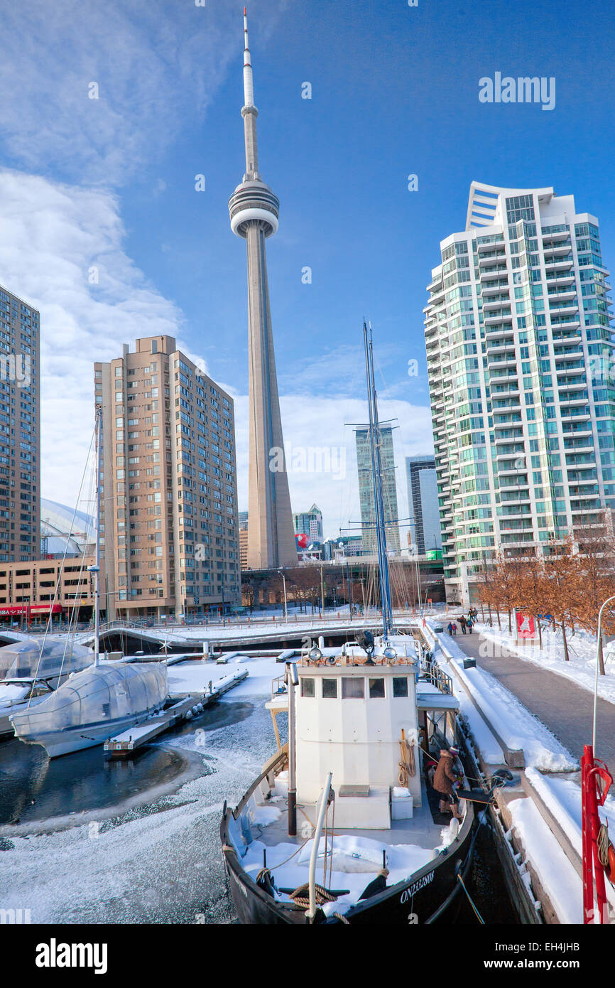 Toronto;Harbor;Capital City of Ontario;Canada in the winter of 2015; Harbor with ice and snow and boats and CN tower Stock Photo