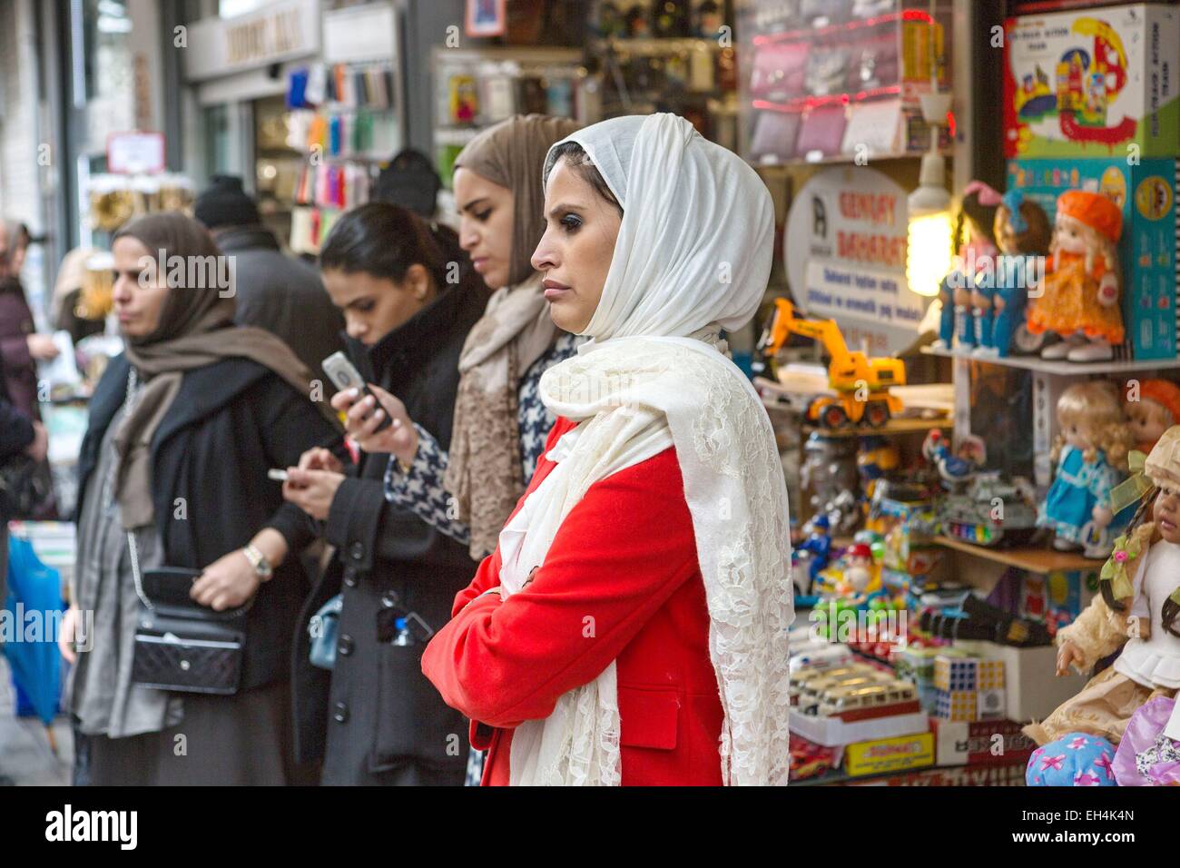 Turkey, Istanbul, historical centre listed as World Heritage by UNESCO, Sultanahmet District, the Egyptian Bazaar (Misir Carsisi), also called the spice market, young Turkish women in front of a toy store Stock Photo