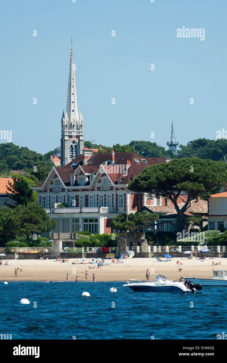 France, Gironde, Arcachon, beach view from the sea and bell tower of the Church of Our Lady of Arachon Stock Photo