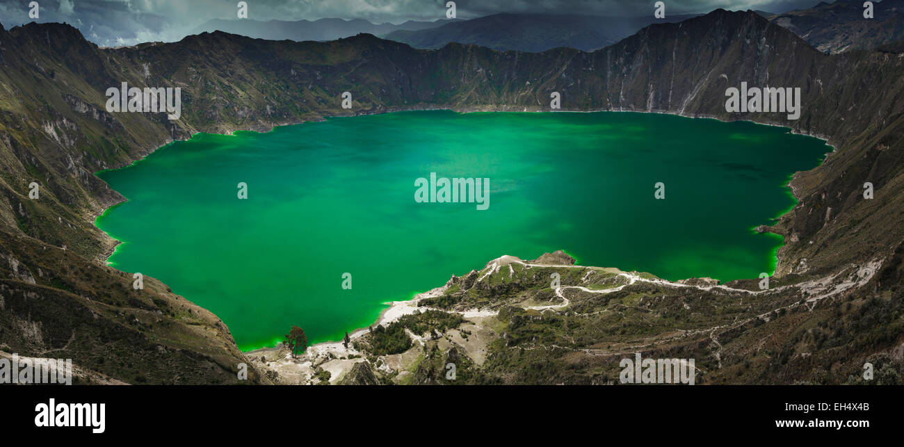 Ecuador, Cotopaxi, Quilotoa Crater Lake, panoramic view of a lagoon in the crater of an extinct volcano under a stormy day Stock Photo