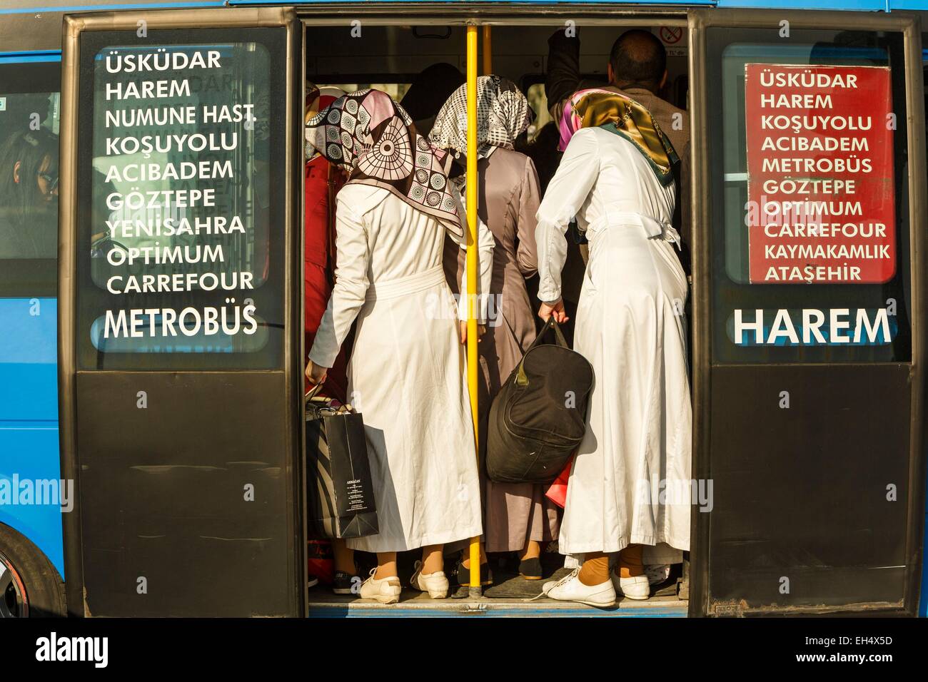 Turkey, Istanbul, Uskudar district, Turkish young women riding on a crowded bus Stock Photo