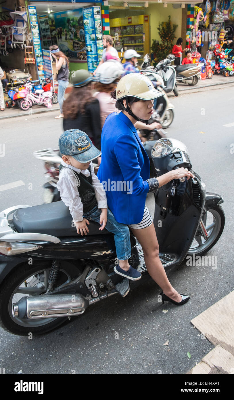 child,children,Mother, and, child, on a scooter. pollution,noise, traffic,Ha Noi,Hanoi, Vietnam